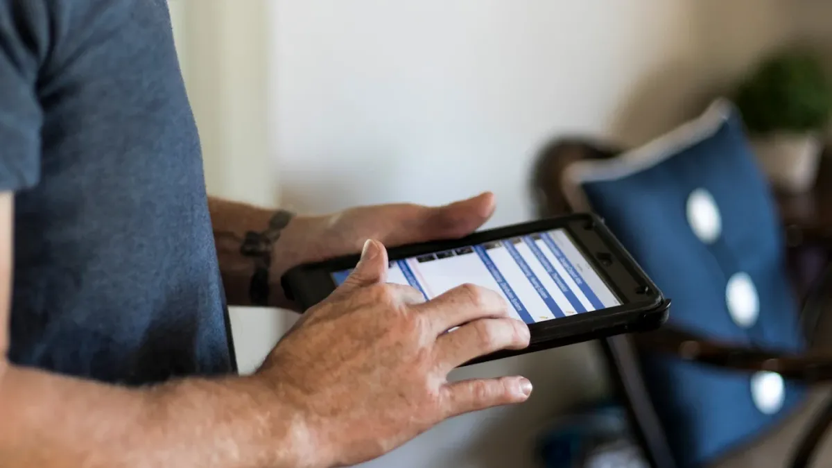 certified, insured, licensed and bonded home inspector Steve Cauvel entering house inspection notes in his iPad